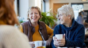 Friends meeting in cafe cup tea coffee 